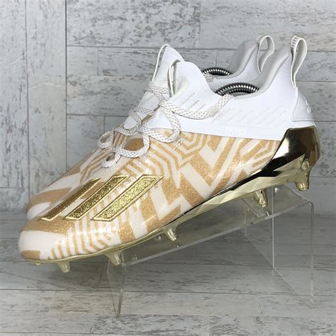 football cleats adidas gold and white